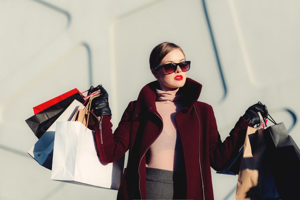 photo-of-woman-holding-white-and-black-paper-bags-3q3tsj01nc Shopping freak